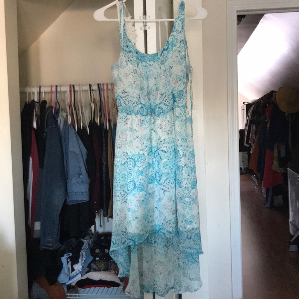 I am selling a light blue and white dress.